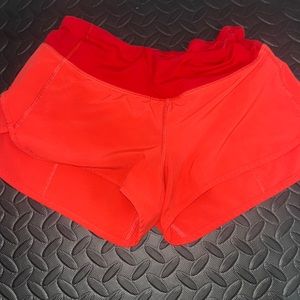 orange Lululemon 2.5 speed ups
